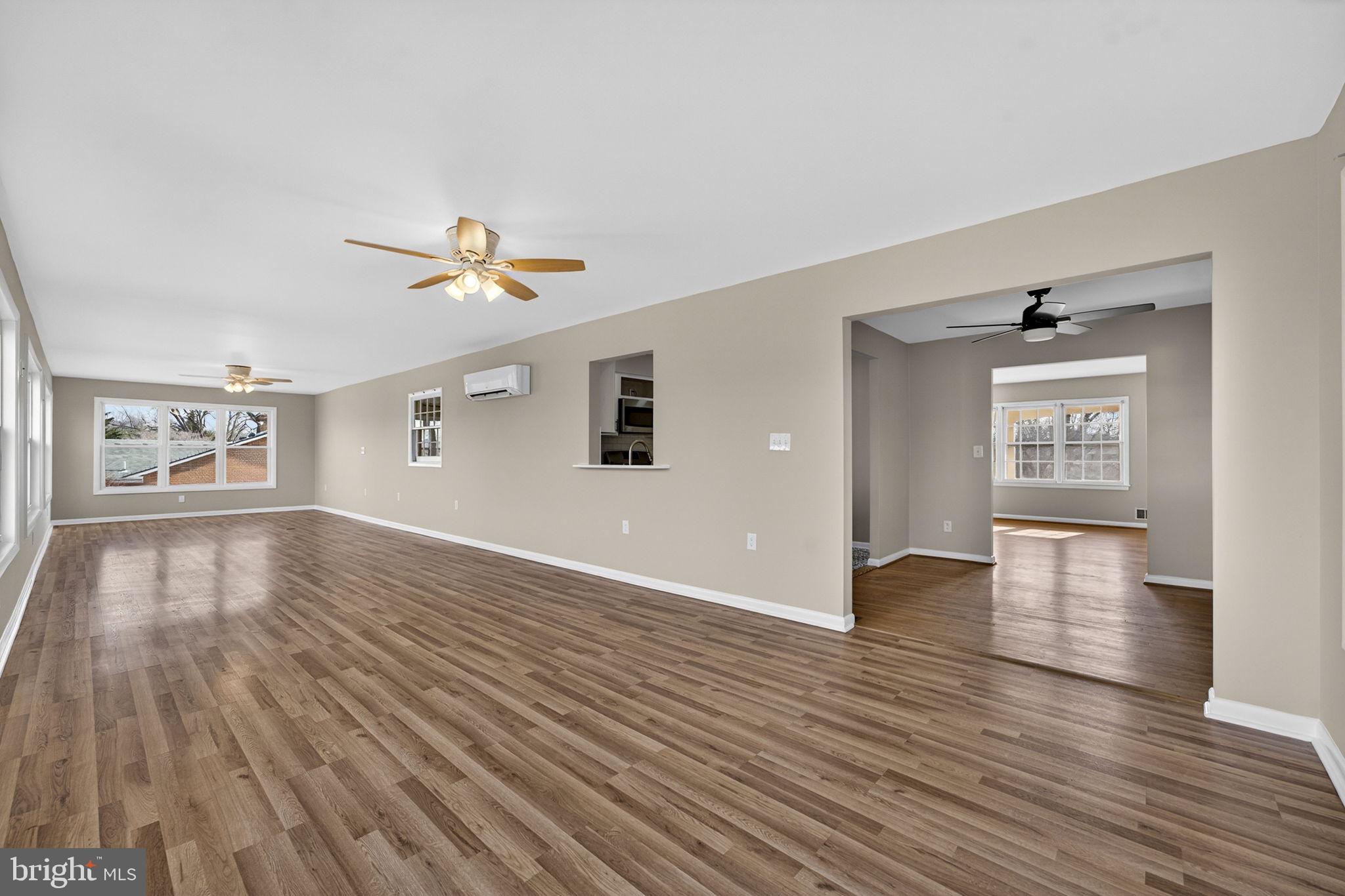 660 Foxcroft Road Warrenton, VA 20186 - Photo 13 of 24 wooden floor in an empty room with a window