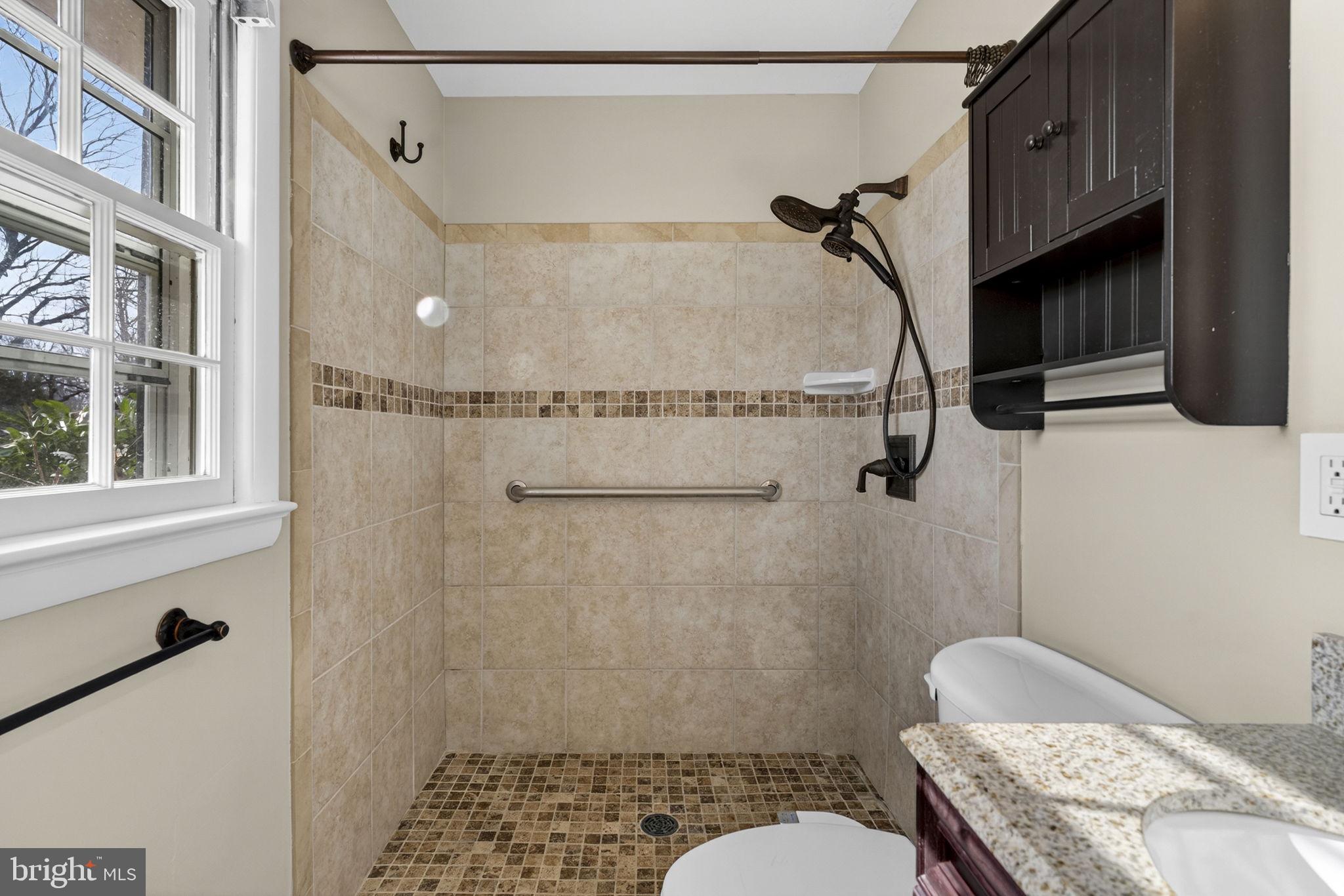 660 Foxcroft Road Warrenton, VA 20186 - Photo 18 of 24 a bathroom with a sink toilet and shower