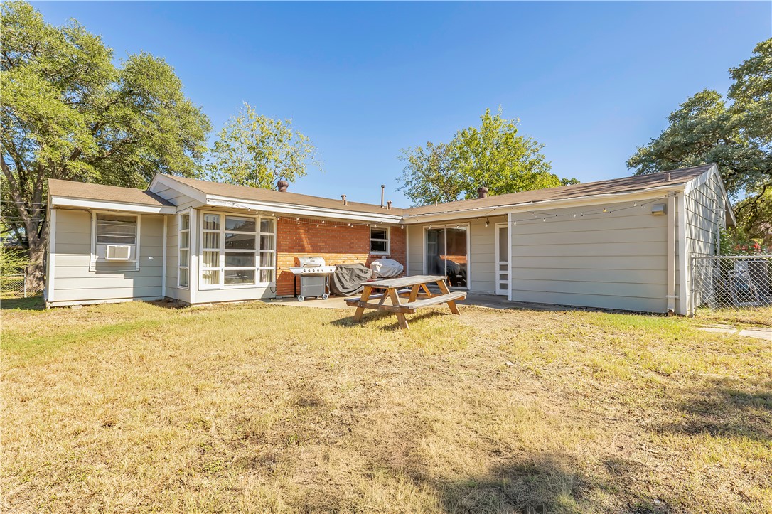 520 Helena Street Bryan, TX 77801 - Photo 25 of 25 a swimming pool with outdoor seating and yard