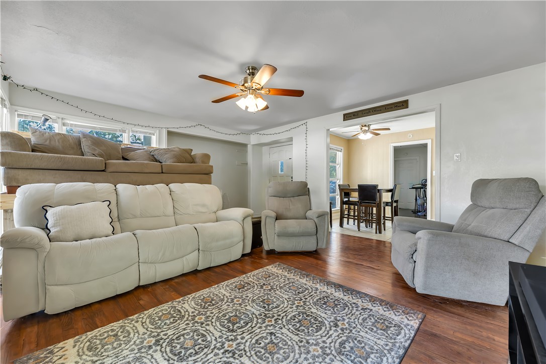 520 Helena Street Bryan, TX 77801 - Photo 3 of 25 a living room with furniture a rug and a rug