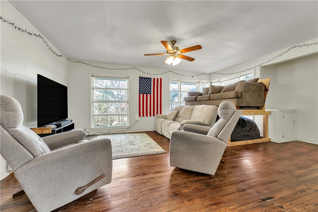 520 Helena Street Bryan, TX 77801 - Photo 4 of 25 a living room with furniture and a flat screen tv