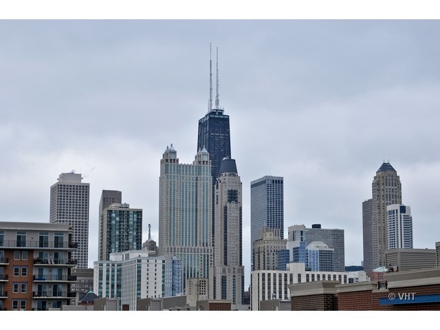 511 West Division Street, Unit 312 Chicago, IL 60610 - Photo 9 of 10 a view of city with tall buildings