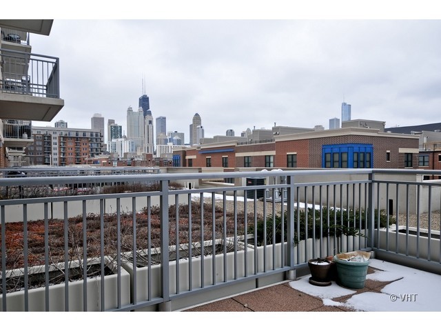 511 West Division Street, Unit 312 Chicago, IL 60610 - Photo 10 of 10 a view of city from a balcony