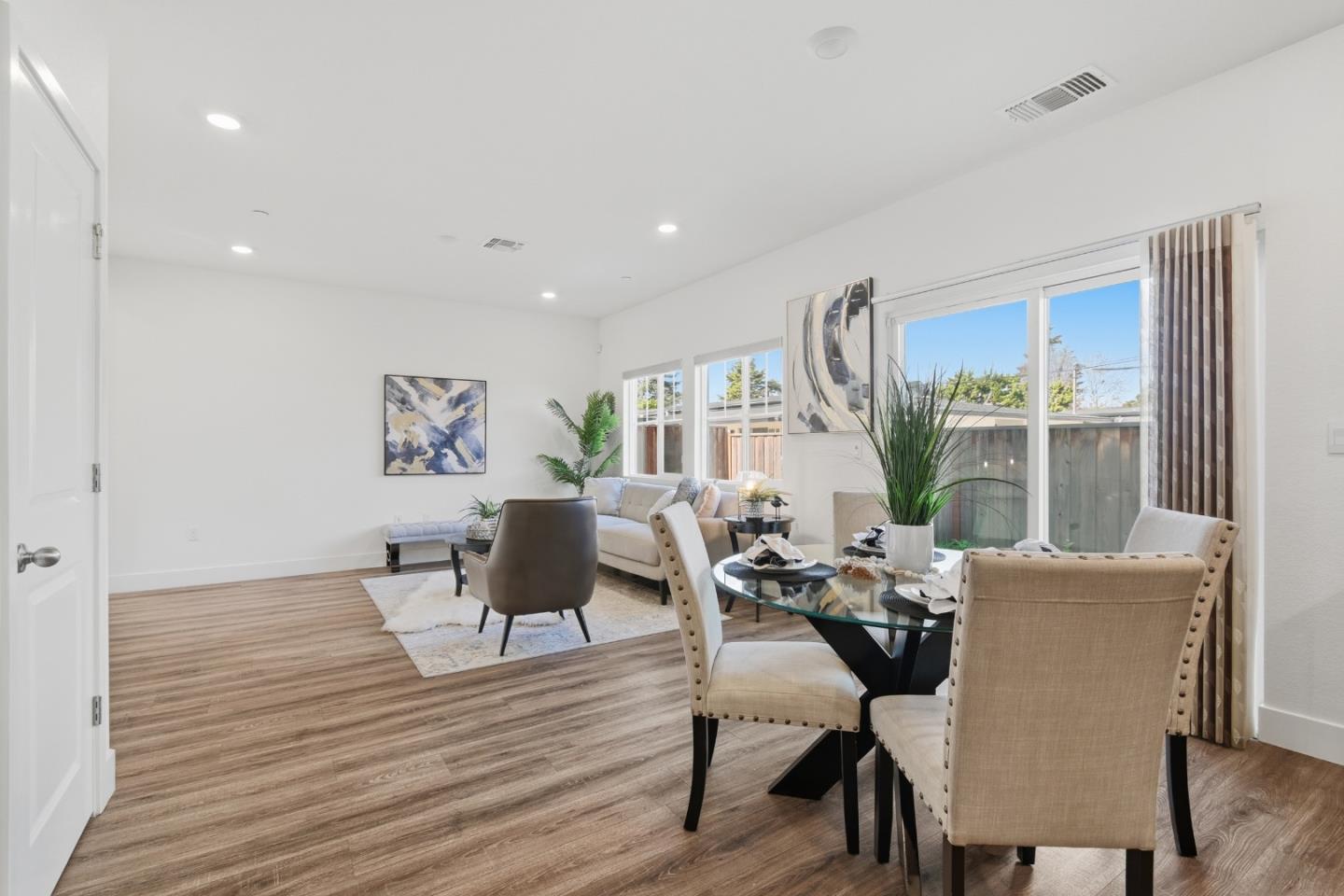 121 Mountaintop Avenue Hayward, CA 94544 - Photo 14 of 38 a dining room with furniture window and wooden floor