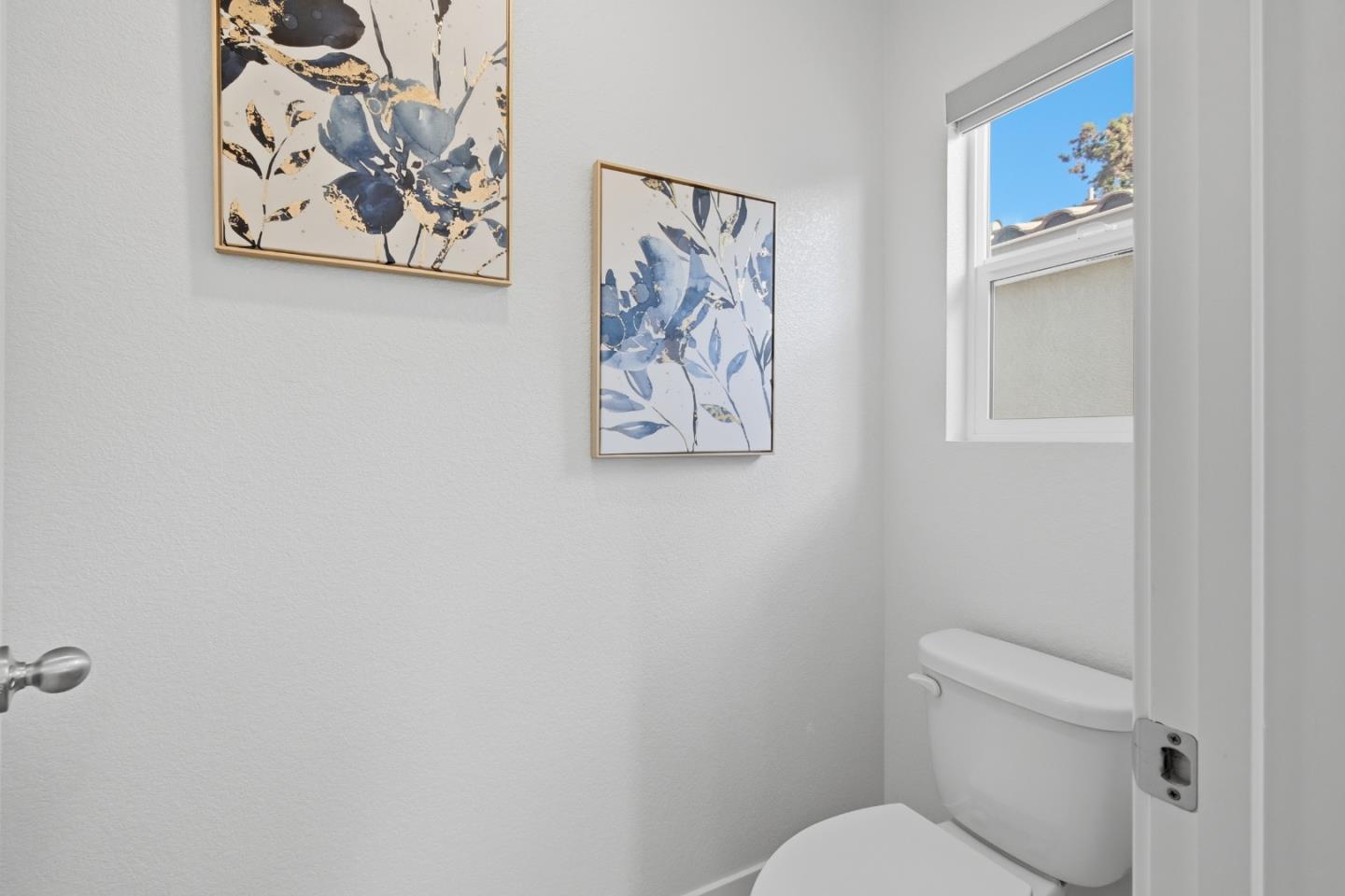 121 Mountaintop Avenue Hayward, CA 94544 - Photo 22 of 38 a white toilet sitting next to a small bathroom
