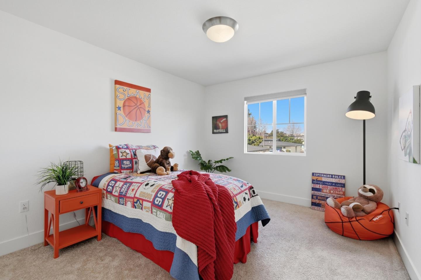 121 Mountaintop Avenue Hayward, CA 94544 - Photo 23 of 38 a bedroom with a bed and a chandelier