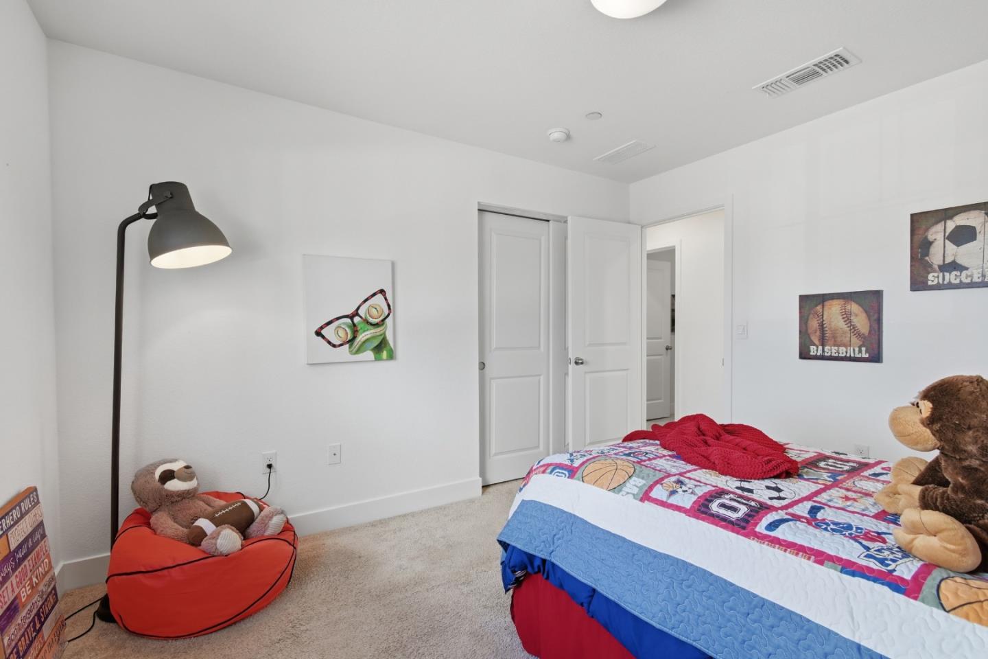 121 Mountaintop Avenue Hayward, CA 94544 - Photo 24 of 38 a bedroom with a bed and cabinets