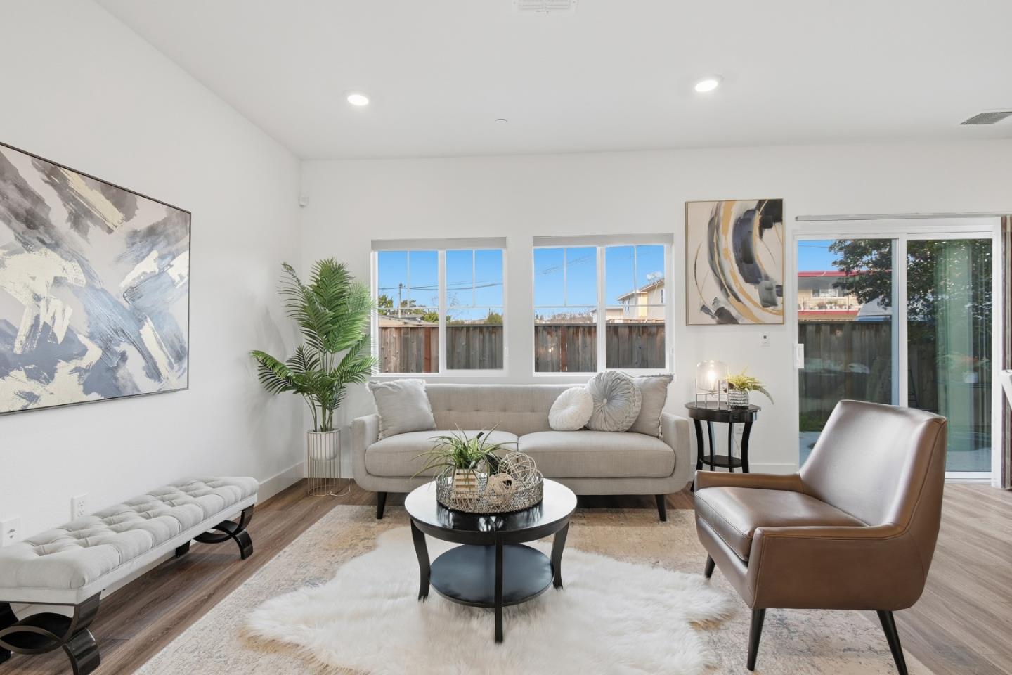 121 Mountaintop Avenue Hayward, CA 94544 - Photo 6 of 38 a living room with furniture and a large window