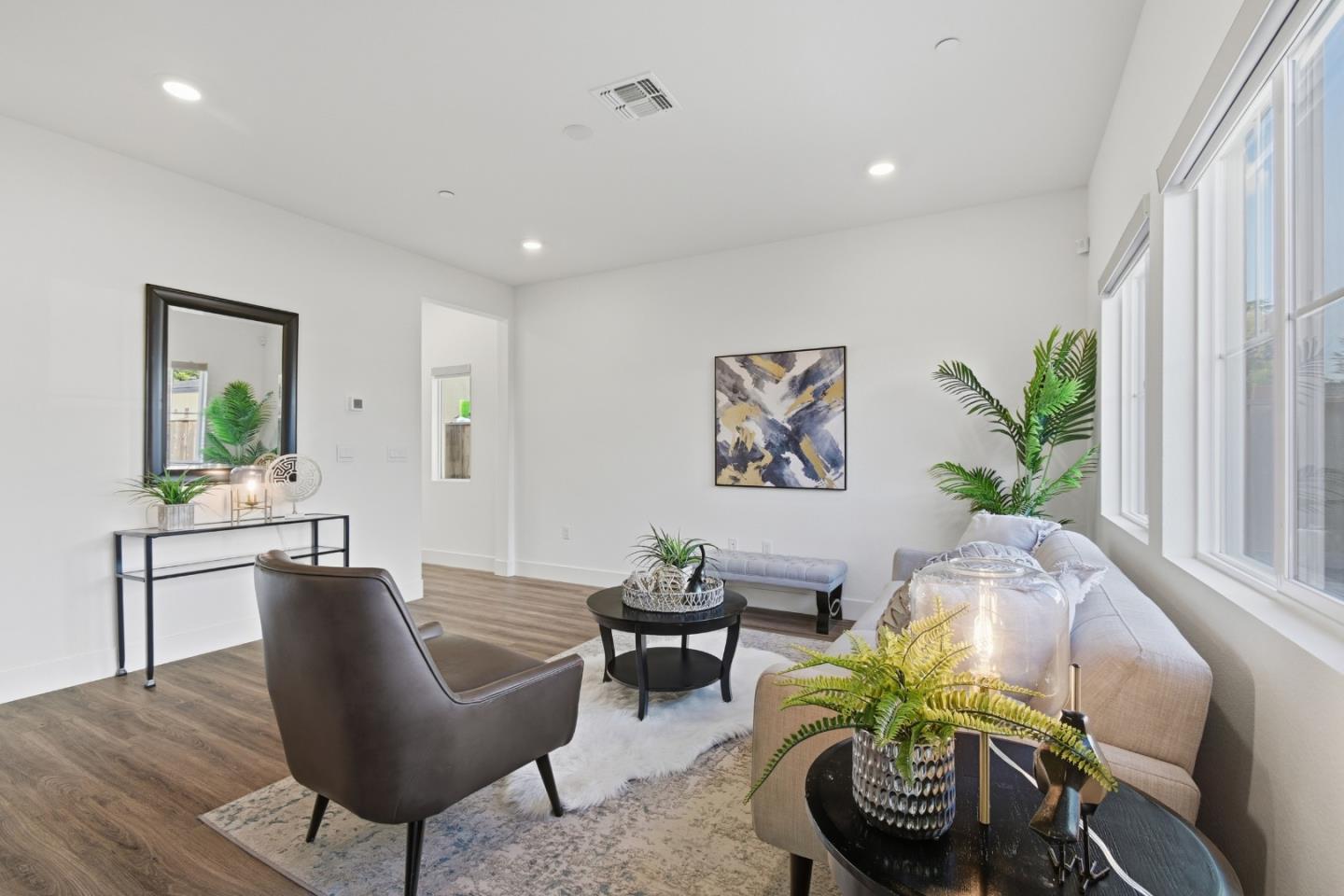 121 Mountaintop Avenue Hayward, CA 94544 - Photo 8 of 38 a living room with furniture and a potted plant