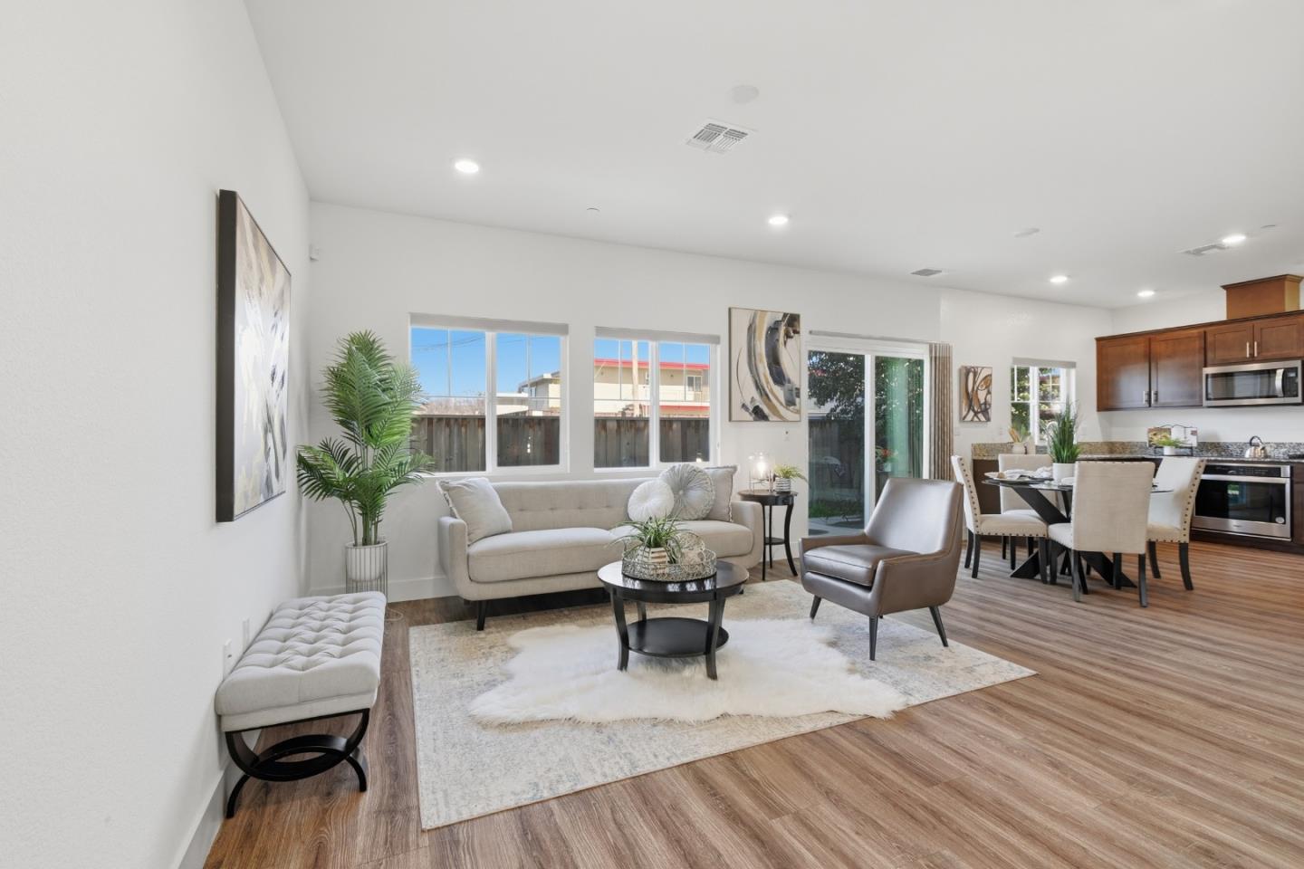 121 Mountaintop Avenue Hayward, CA 94544 - Photo 9 of 38 a living room with furniture and a wooden floor