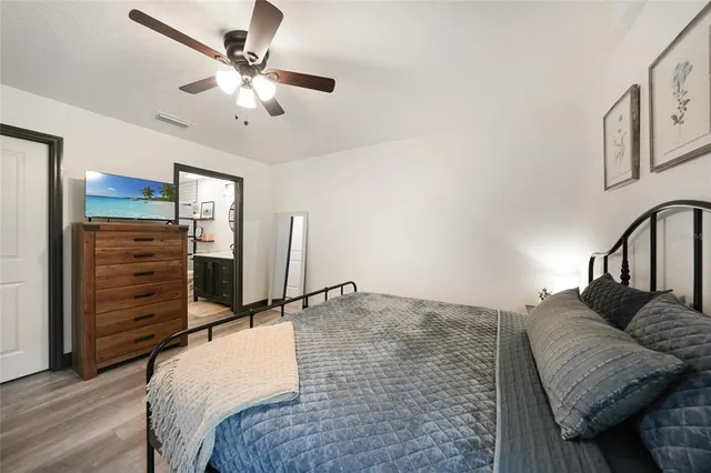 a view of backyard with trampoline