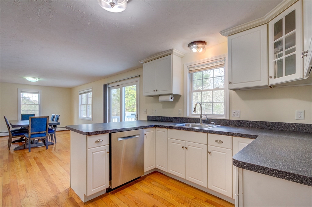 17 Lynne Road Wareham, MA 02571 - Photo 13 of 42 a kitchen with a sink cabinets and window