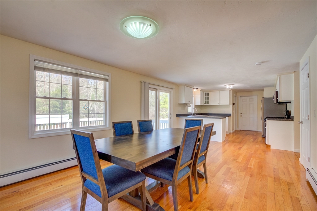 17 Lynne Road Wareham, MA 02571 - Photo 16 of 42 a view of a dining room with furniture and wooden floor