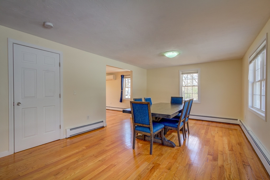 17 Lynne Road Wareham, MA 02571 - Photo 17 of 42 a view of a dining room with furniture and wooden floor