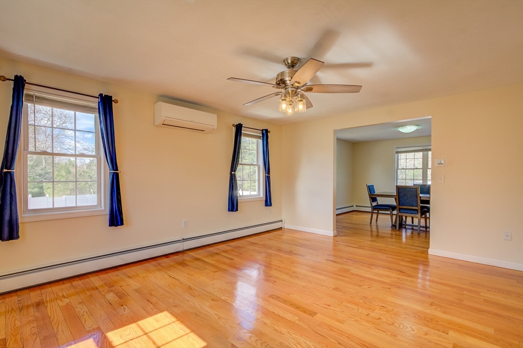 17 Lynne Road Wareham, MA 02571 - Photo 19 of 42 a view of dining room with furniture window and wooden floor
