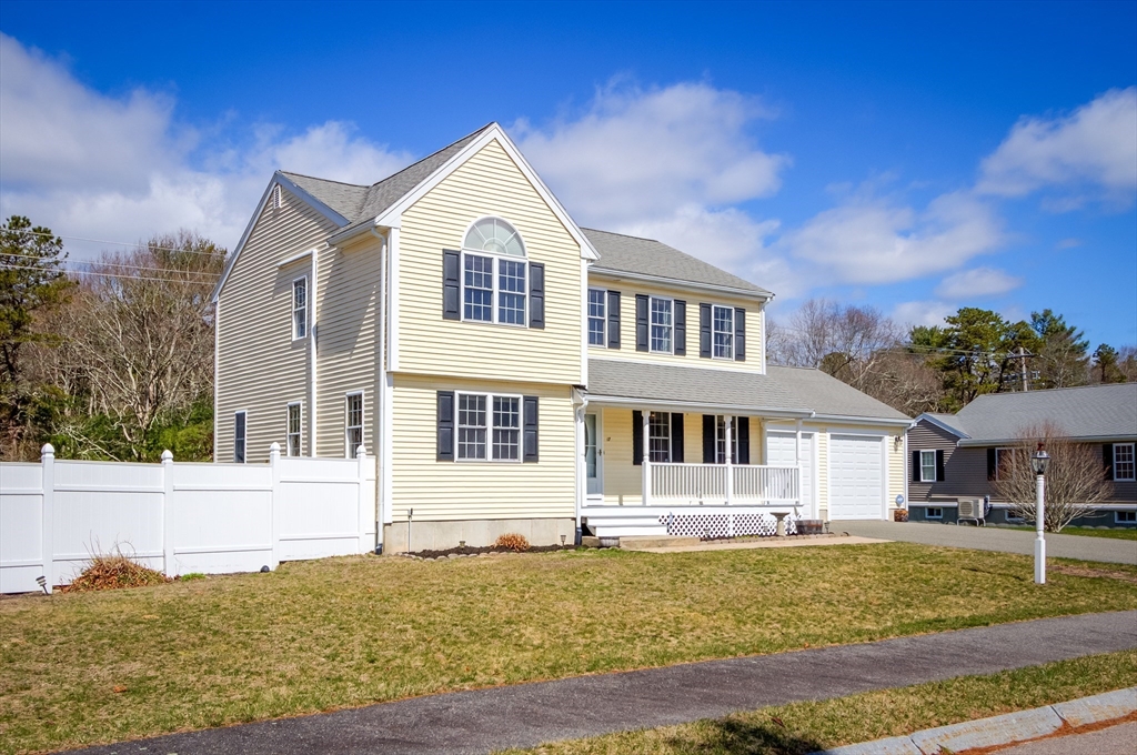 17 Lynne Road Wareham, MA 02571 - Photo 2 of 42 a front view of a house with a yard