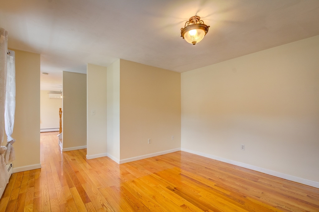 17 Lynne Road Wareham, MA 02571 - Photo 25 of 42 a view of empty room with wooden floor