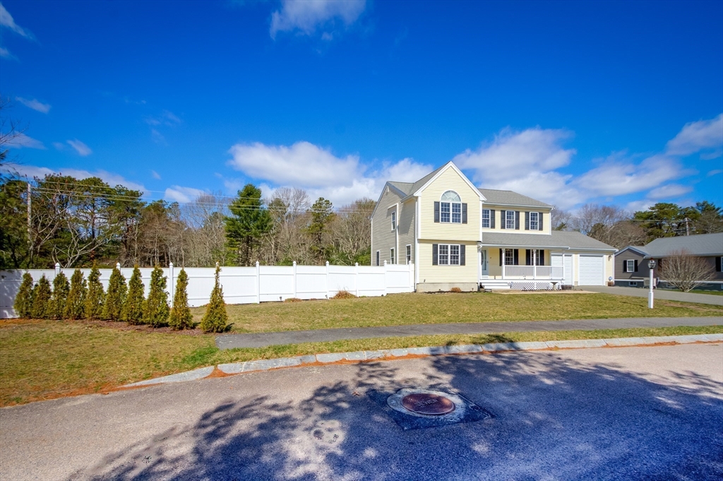 17 Lynne Road Wareham, MA 02571 - Photo 3 of 42 a front view of a house with a yard