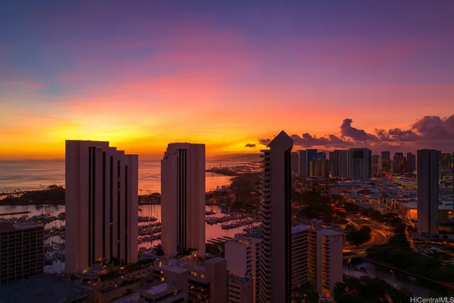 a view of a city with tall buildings