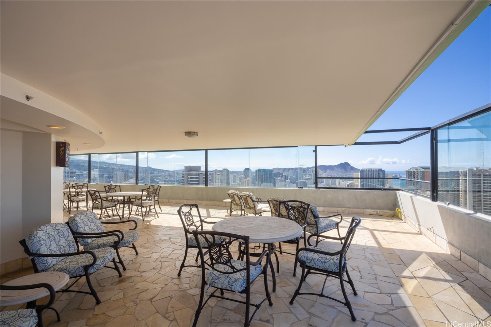 343 Hobron Lane, Unit 3901 Honolulu, HI 96815 - Photo 19 of 25 a view of a dining room with furniture and front door