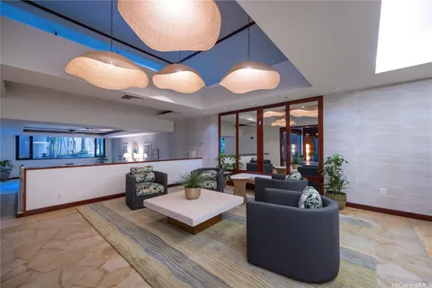 a living room with furniture and window