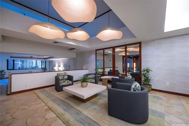 a living room with furniture and window