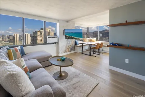 a living room with furniture and a couch