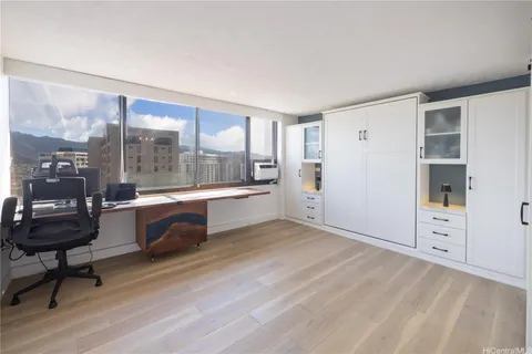 a room with a bed and a window