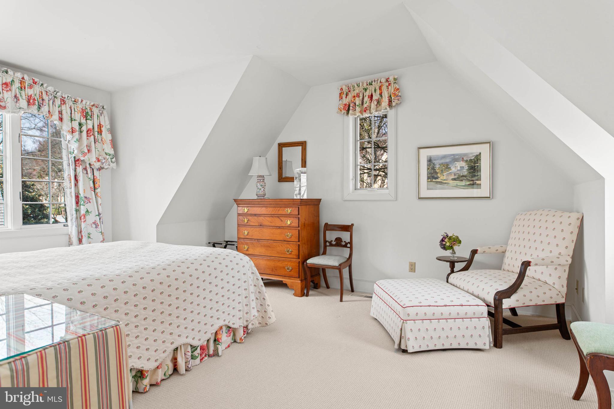 1244 Denbigh Lane Wayne, PA 19087 - Photo 17 of 38 a bedroom with furniture and a lamp
