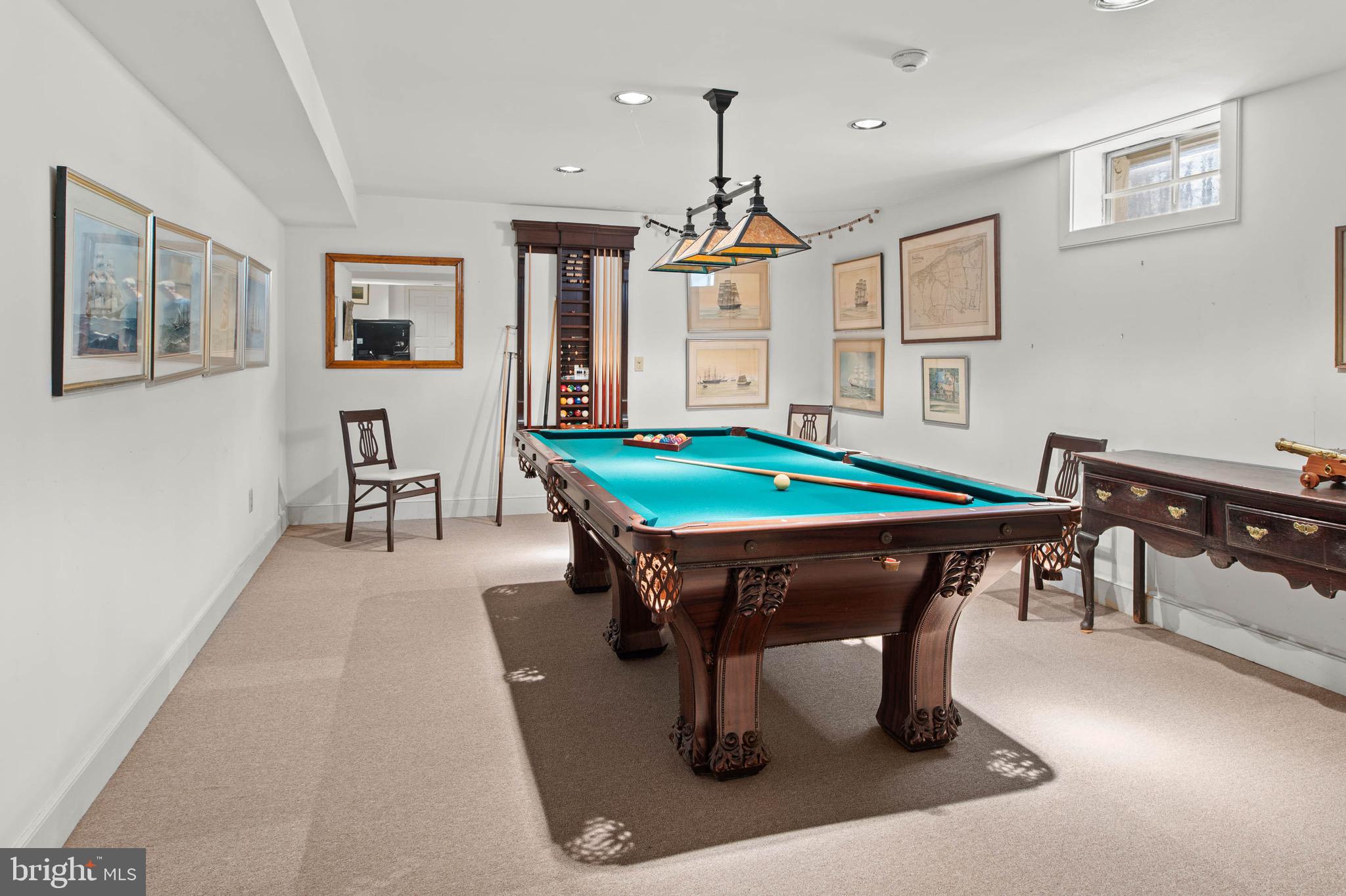 1244 Denbigh Lane Wayne, PA 19087 - Photo 30 of 38 a room with furniture pool table flat screen tv and windows