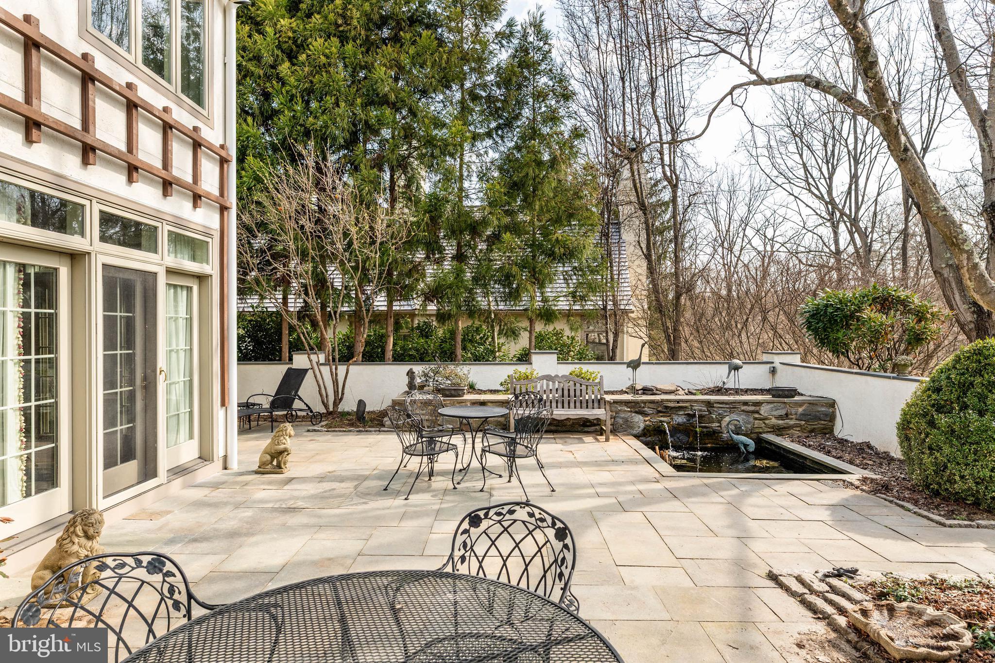 1244 Denbigh Lane Wayne, PA 19087 - Photo 34 of 38 a view of a patio with couches and potted plants