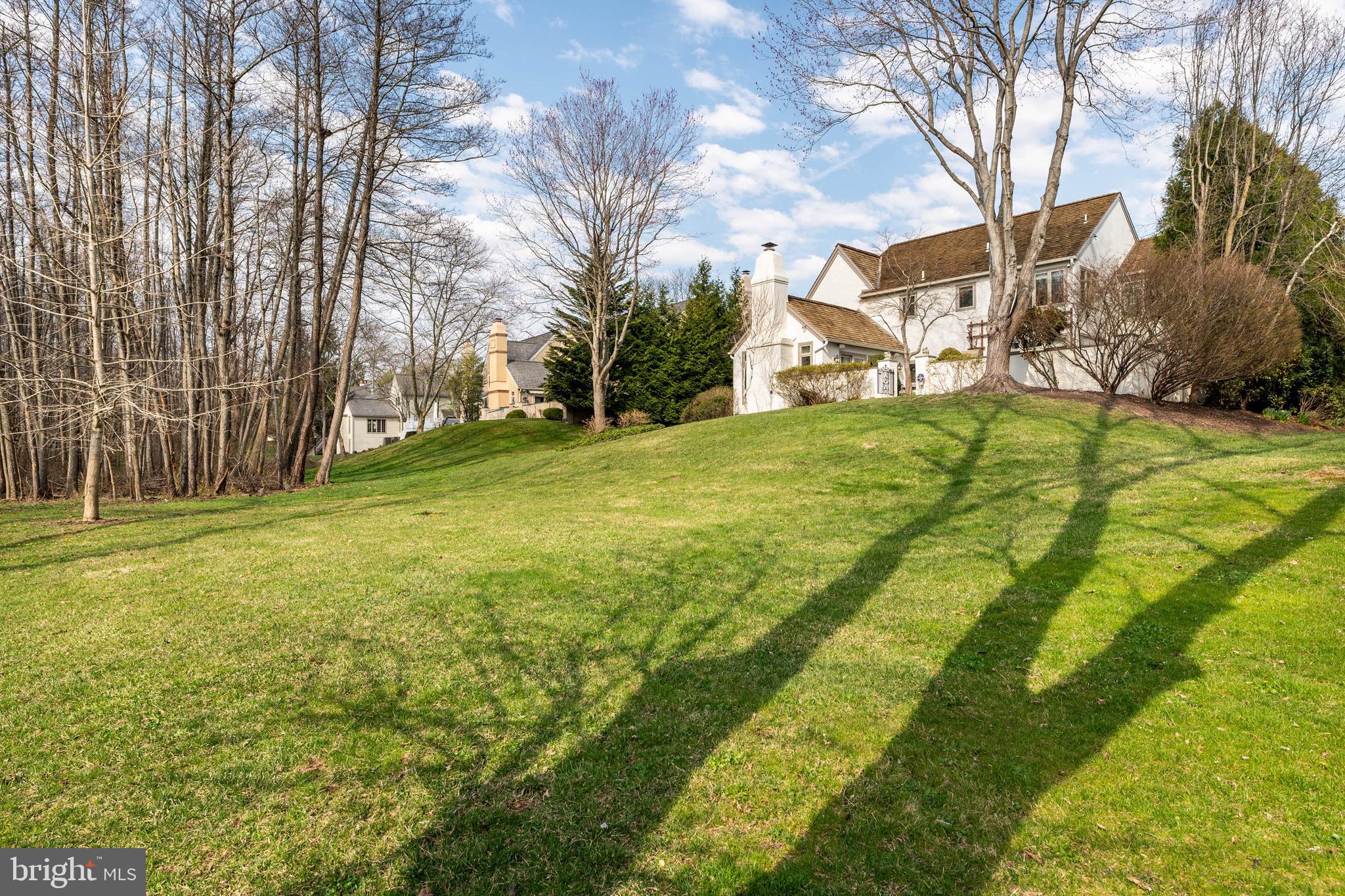 1244 Denbigh Lane Wayne, PA 19087 - Photo 36 of 38 a view of yard with swimming pool and green space