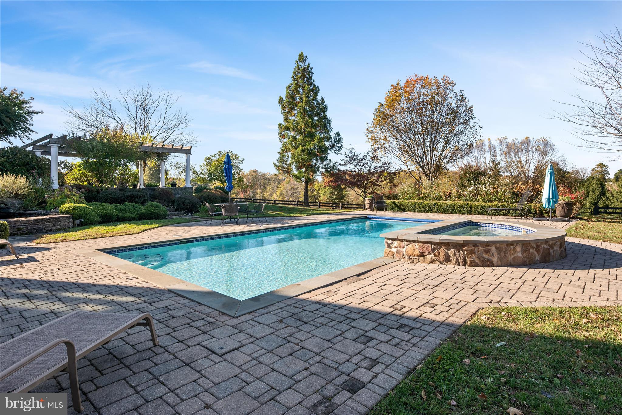 17635 Harmony Church Road Hamilton, VA 20158 - Photo 23 of 108 a view of a swimming pool with an outdoor space and seating area