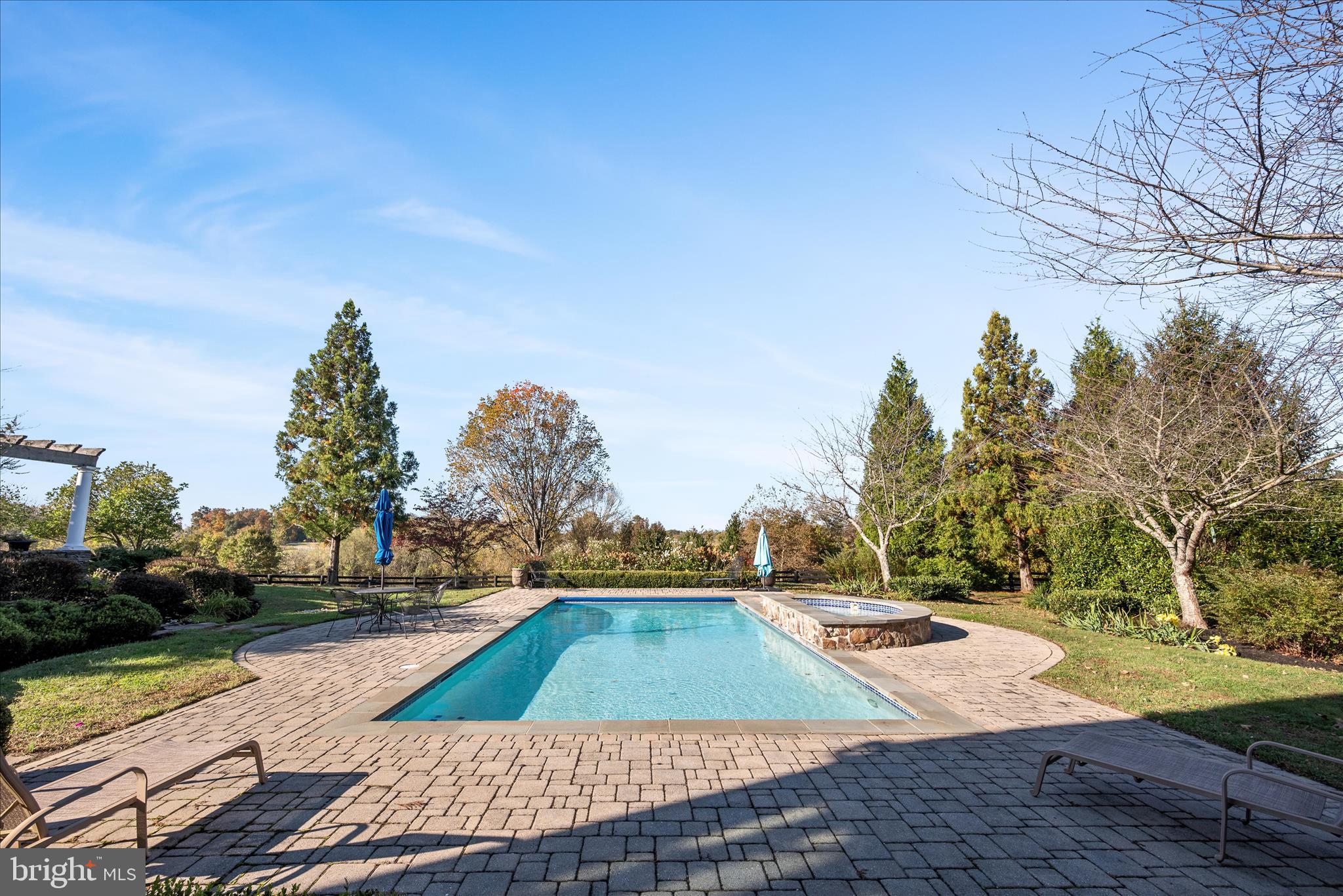 17635 Harmony Church Road Hamilton, VA 20158 - Photo 27 of 108 a view of a swimming pool with an outdoor space and seating area