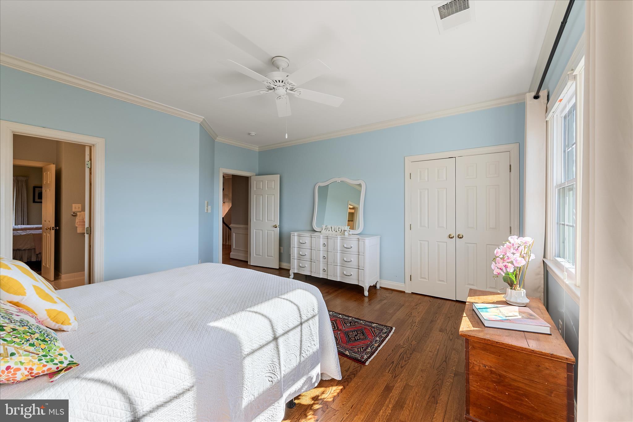17635 Harmony Church Road Hamilton, VA 20158 - Photo 74 of 108 a bedroom with a bed and a chandelier