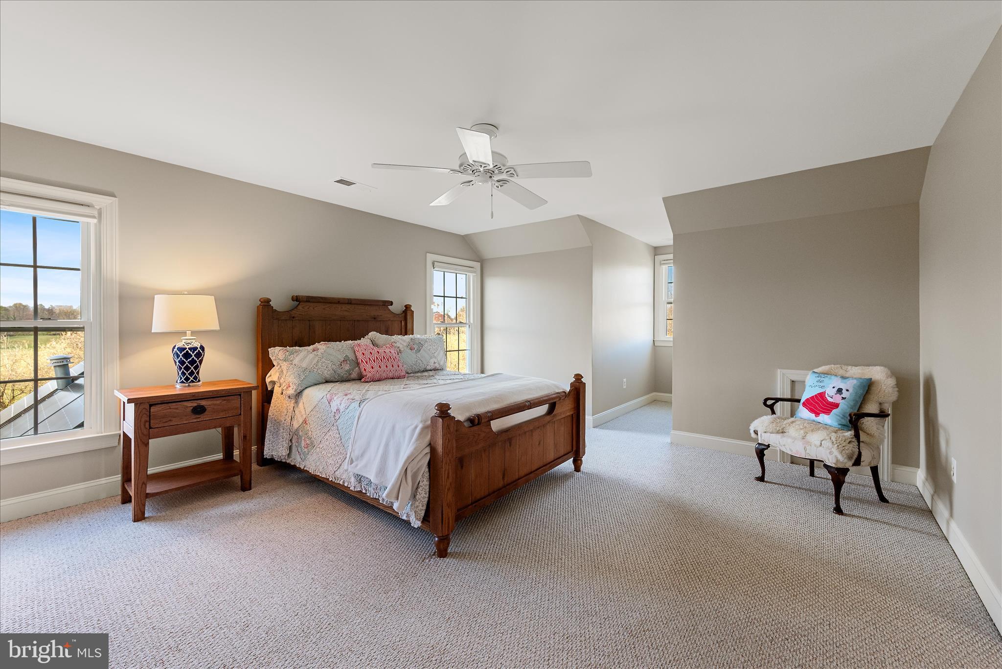 17635 Harmony Church Road Hamilton, VA 20158 - Photo 84 of 108 a spacious bedroom with a bed and a chandelier
