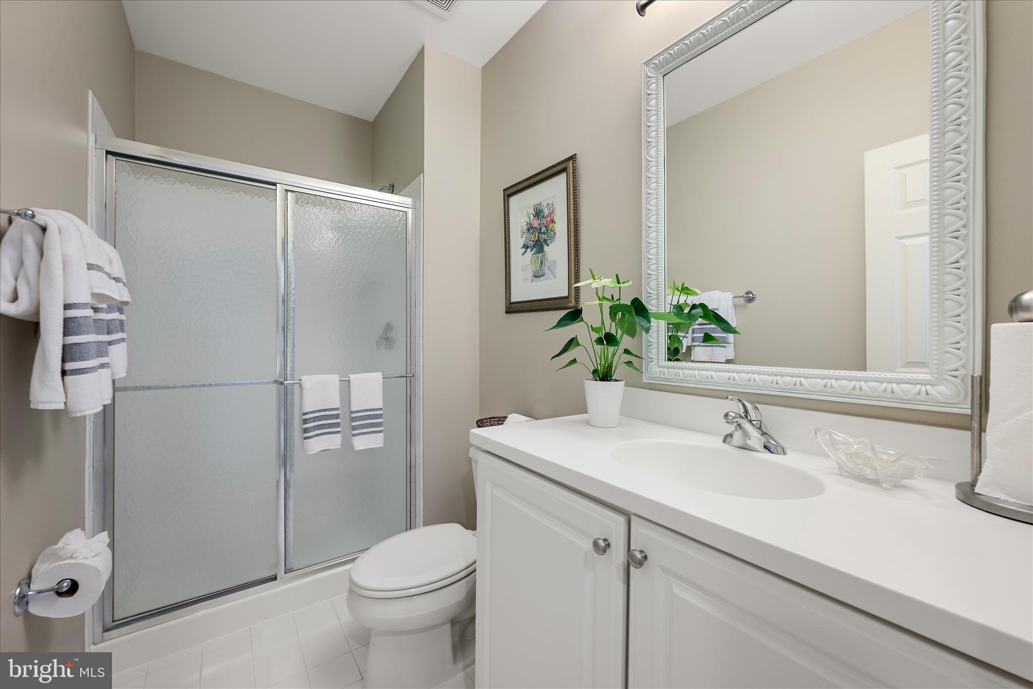 17635 Harmony Church Road Hamilton, VA 20158 - Photo 90 of 108 a bathroom with a sink toilet and shower
