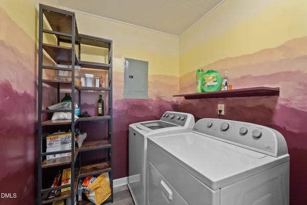 a kitchen that has a sink and a stove