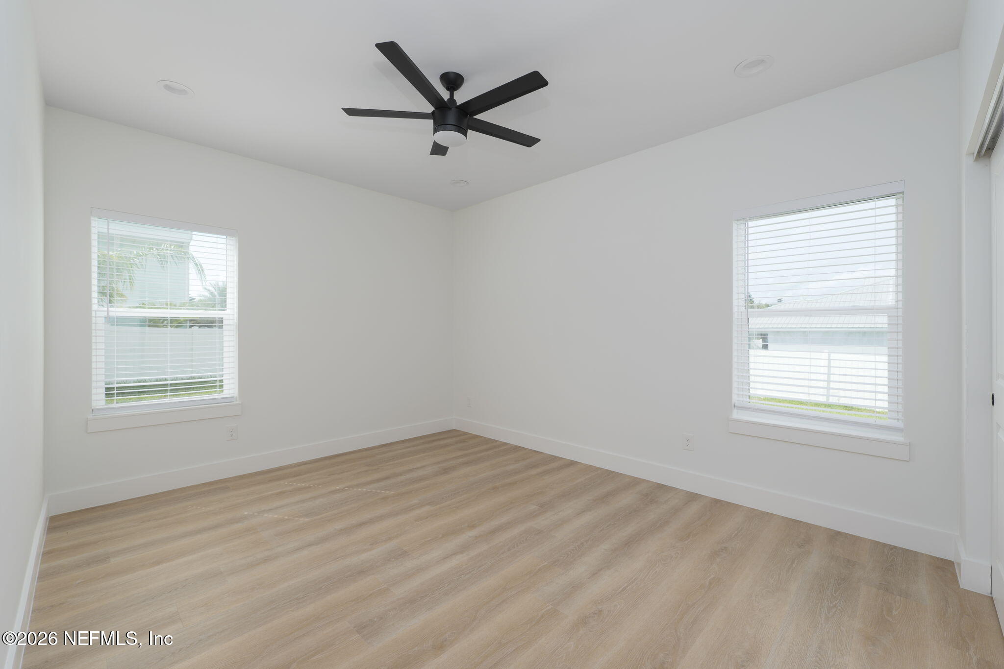 213 Twenty-First Street St. Augustine, FL 32084 - Photo 12 of 50 an empty room with a window