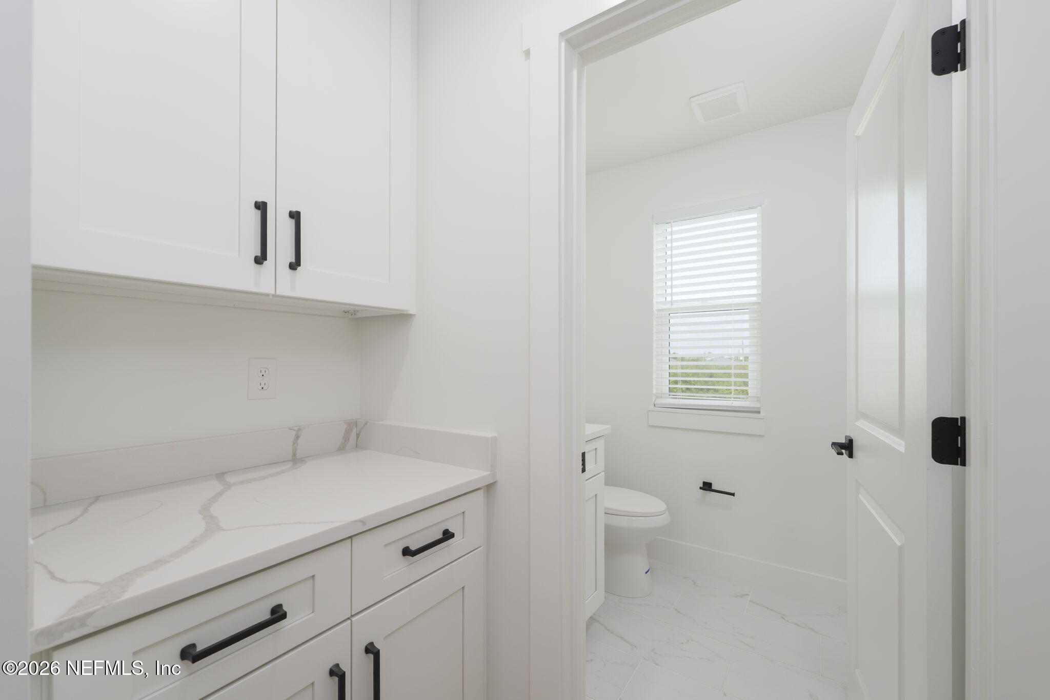 213 Twenty-First Street St. Augustine, FL 32084 - Photo 20 of 50 a view of bathroom with a window