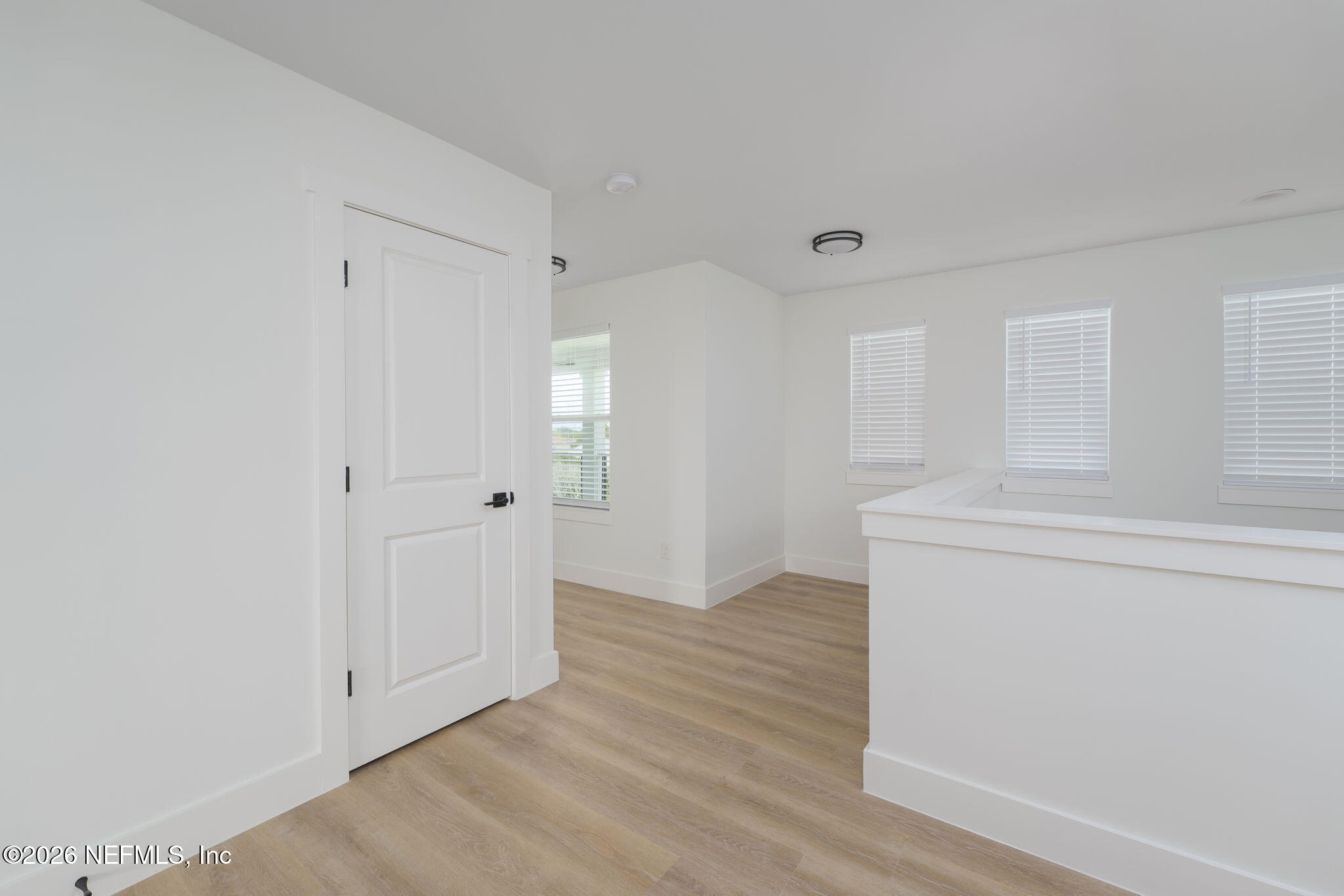 213 Twenty-First Street St. Augustine, FL 32084 - Photo 30 of 50 a view of empty room with wooden floor