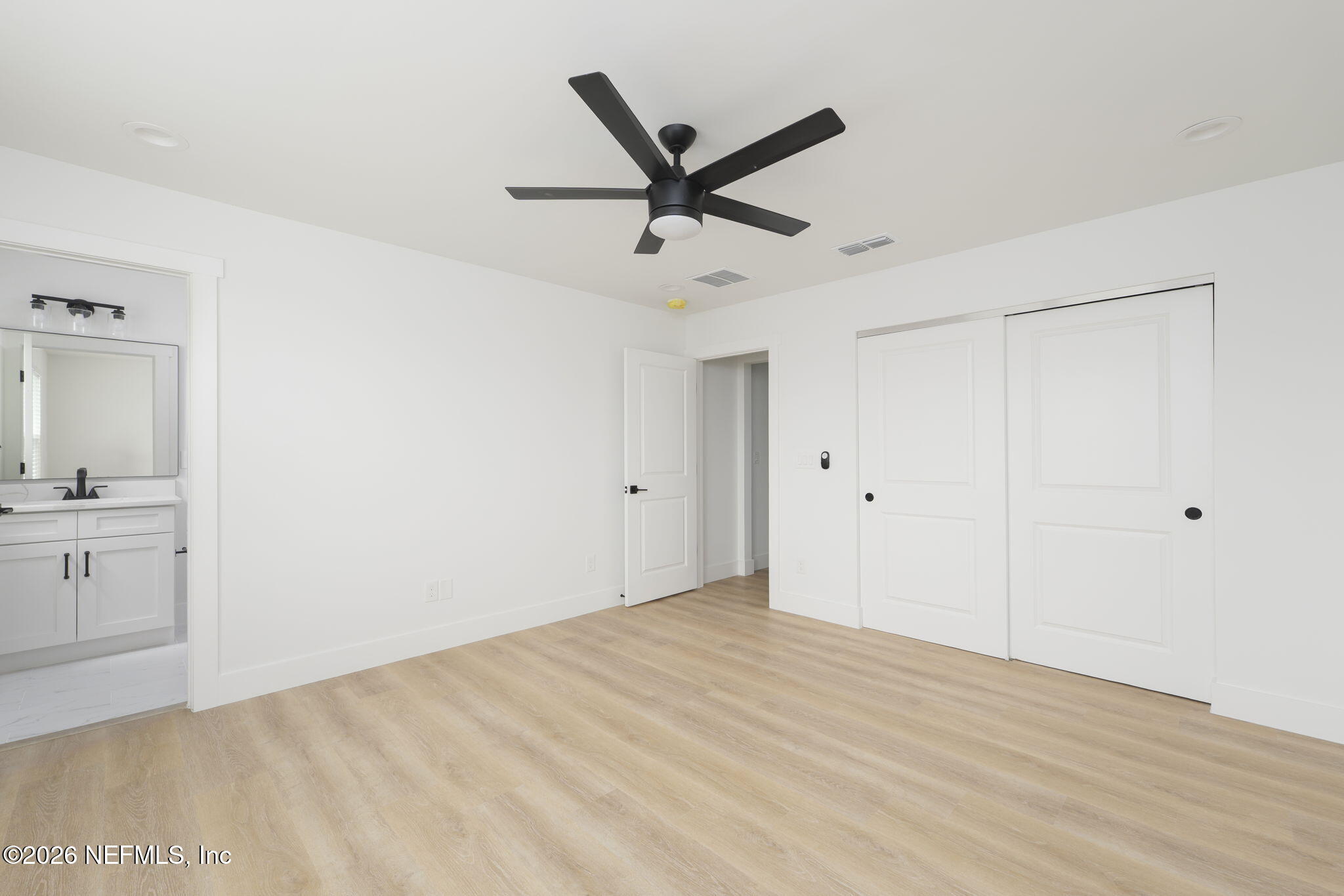 213 Twenty-First Street St. Augustine, FL 32084 - Photo 40 of 50 a view of a livingroom with a ceiling fan & a ceiling fan