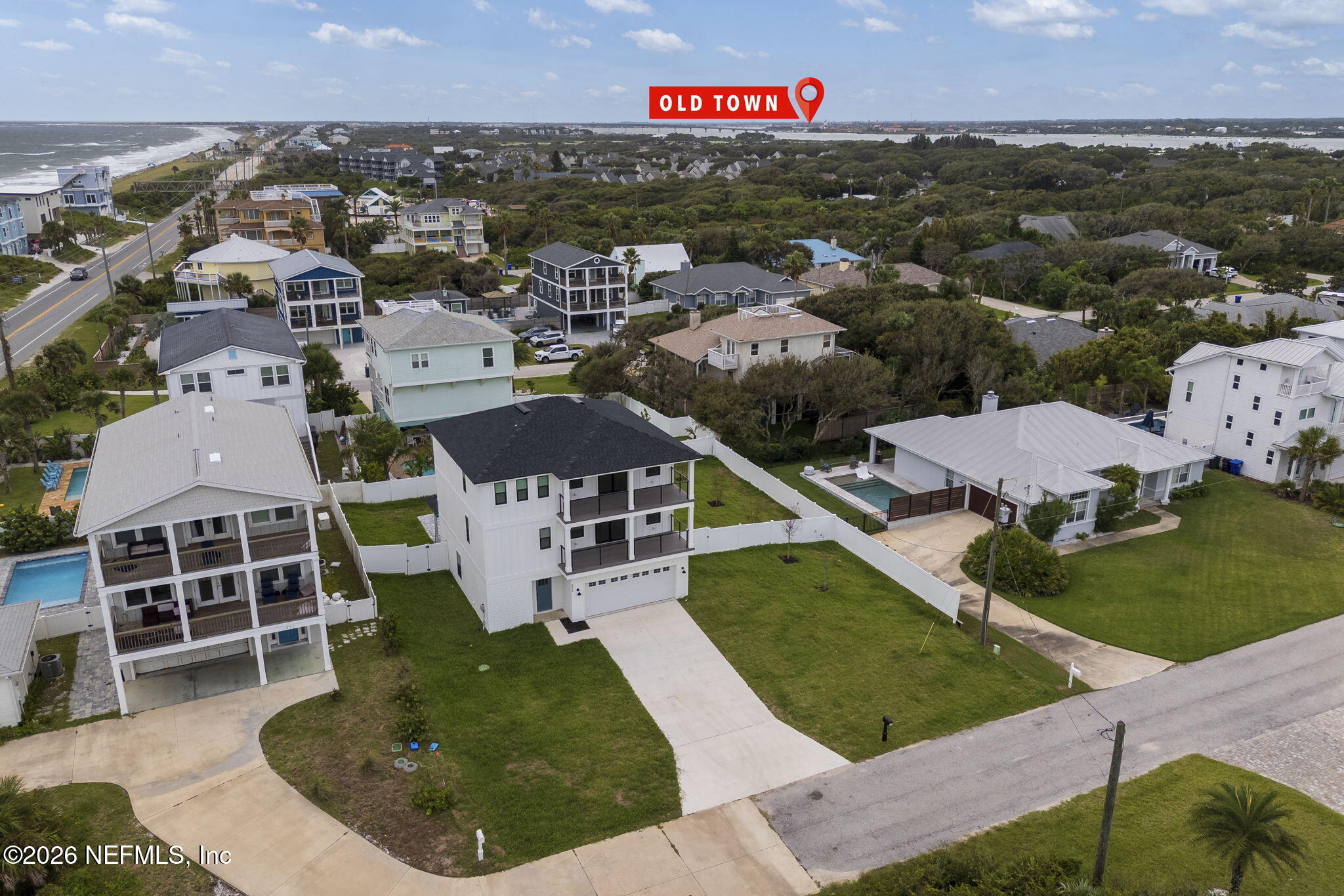 213 Twenty-First Street St. Augustine, FL 32084 - Photo 4 of 50 an aerial view of a house with a garden