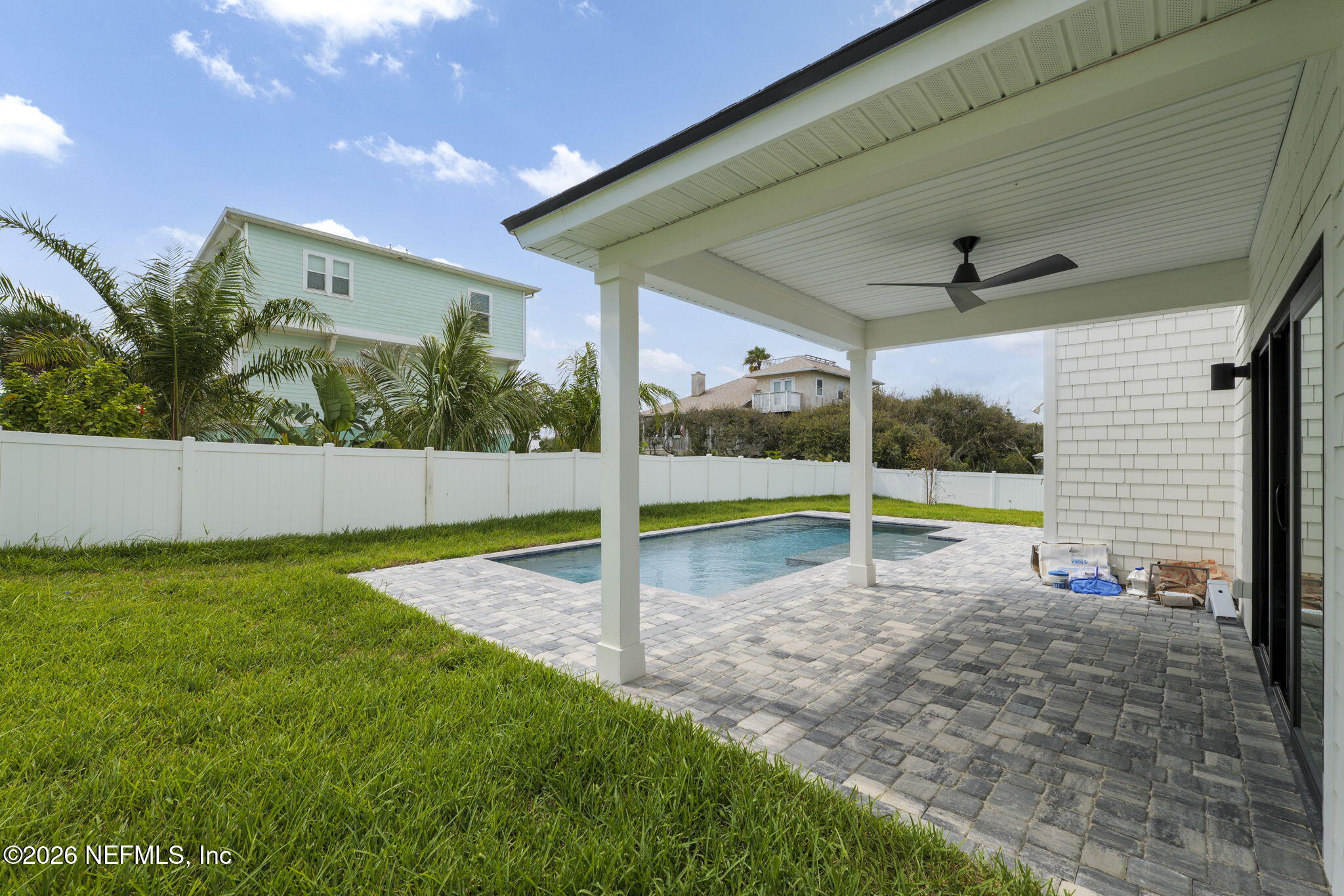 213 Twenty-First Street St. Augustine, FL 32084 - Photo 45 of 50 a view of a swimming pool with a yard