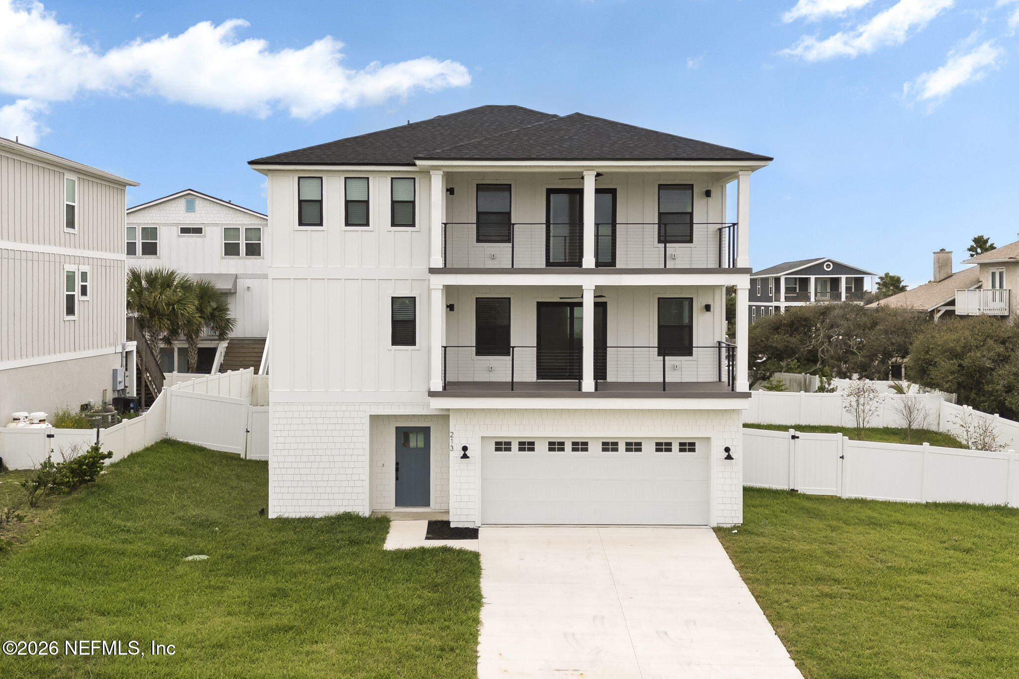213 Twenty-First Street St. Augustine, FL 32084 - Photo 6 of 50 a view of a house with a swimming pool