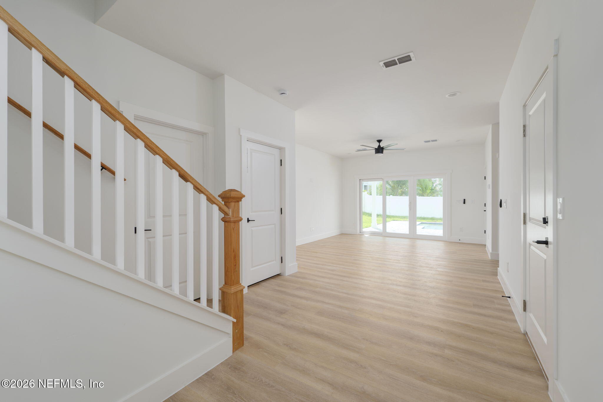 213 Twenty-First Street St. Augustine, FL 32084 - Photo 7 of 50 a view of an entryway with wooden floor