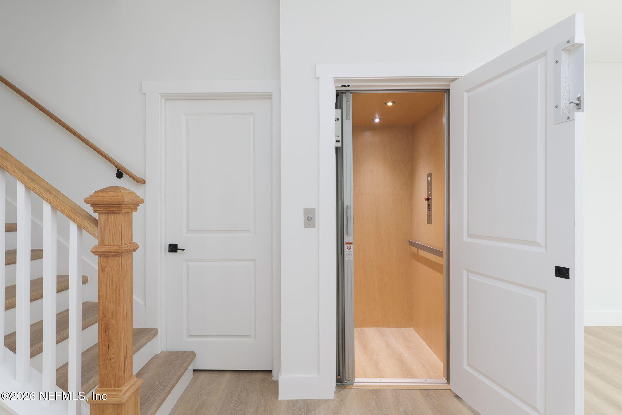 213 Twenty-First Street St. Augustine, FL 32084 - Photo 8 of 50 a view of a hallway with wooden floor and closet