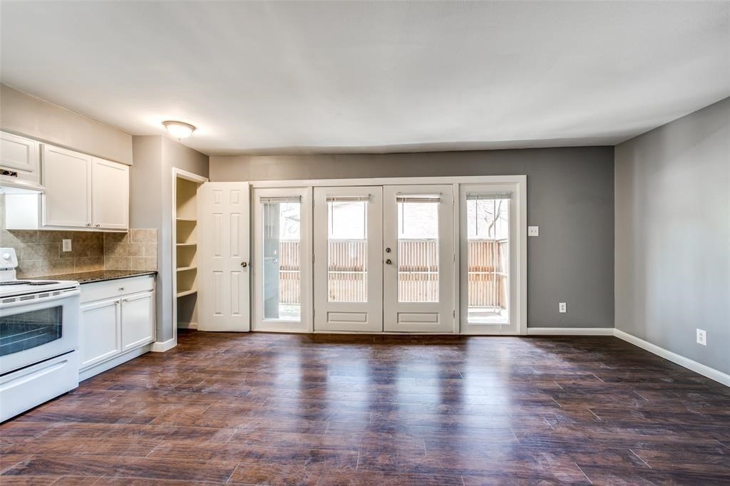 3938 West Alabama Street, Unit 8 Houston, TX 77027 - Photo 5 of 23 French, galss doors and wall of windows offer ample natural light!