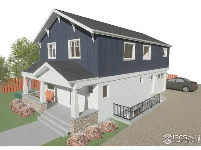 a view of a house with wooden fence