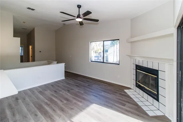 a kitchen with a refrigerator stove and microwave